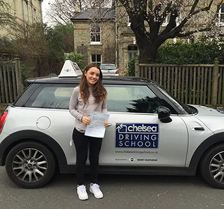 Learner driver in Chelsea Driving School car during lesson in West London