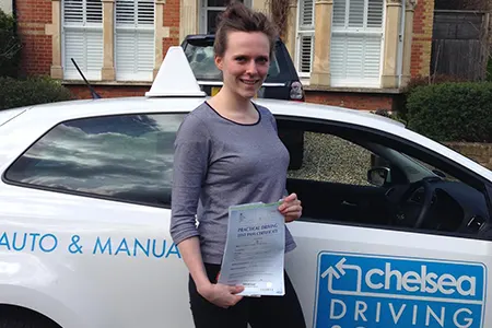 Learner driver in Chelsea Driving School car during lesson in West London