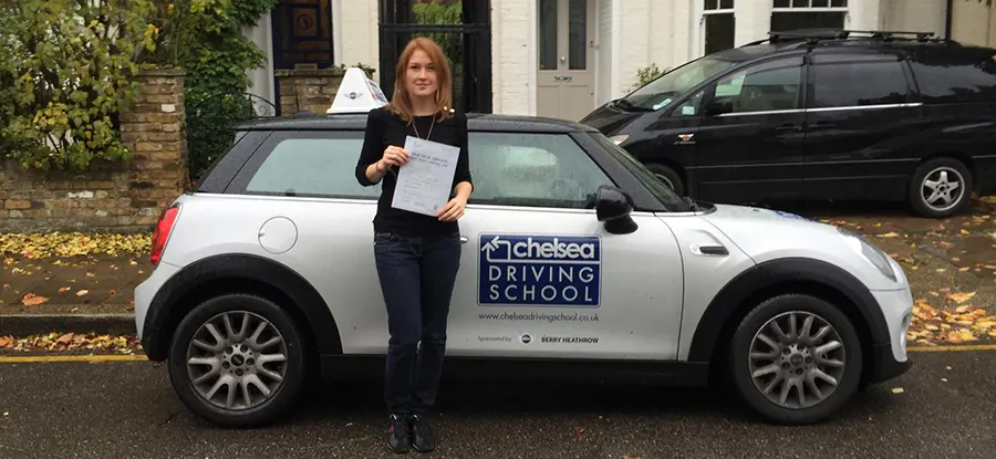 Learner driver in Chelsea Driving School car during lesson in West London