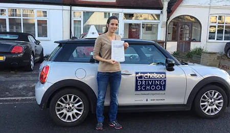 Learner driver in Chelsea Driving School car during lesson in West London